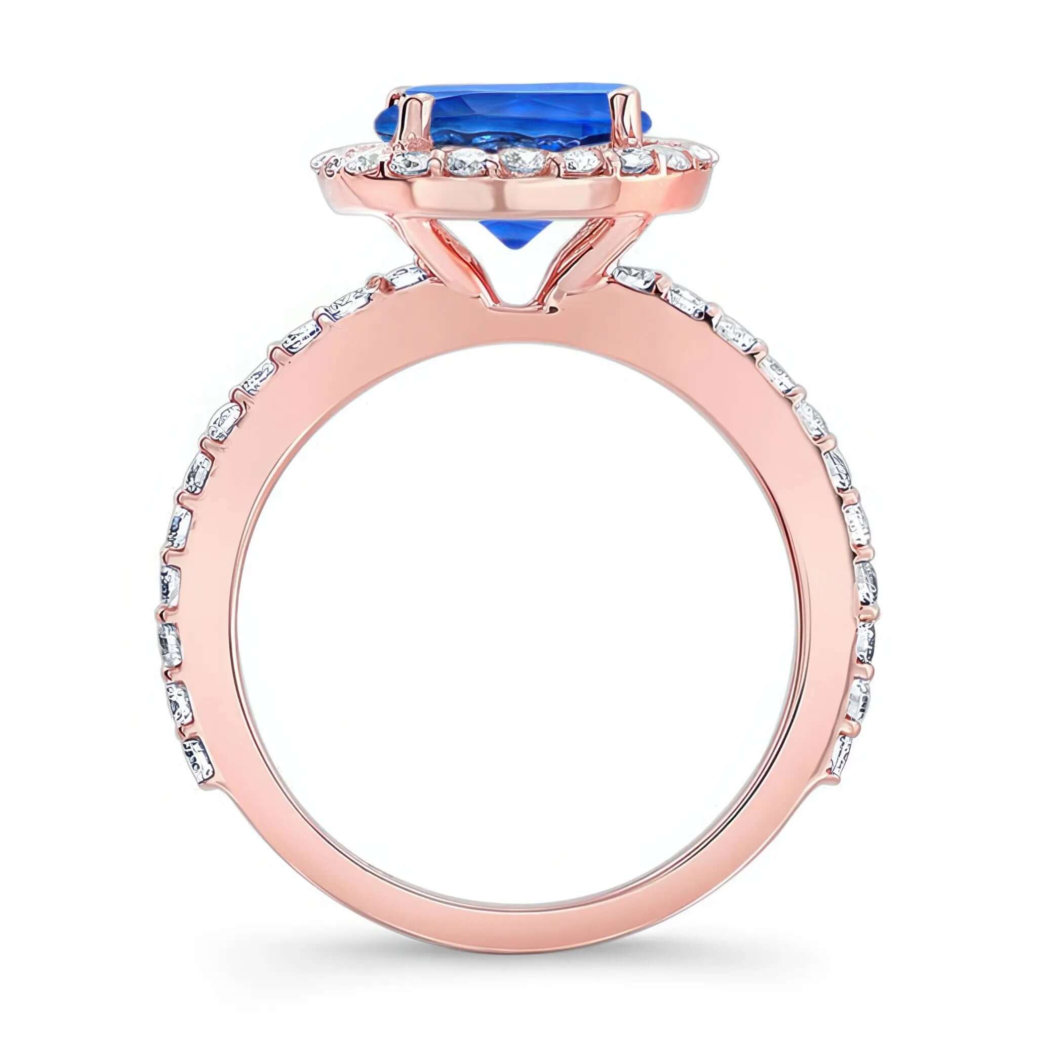 2 Carat Halo Sapphire and diamond Engagement Ring with shared prong set diamonds and elegant design.