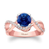 Blue Sapphire And Diamond Infinity Twist Engagement Ring