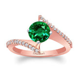 Modern Bypass Emerald And Diamond Engagement Ring
