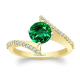 Modern Bypass Emerald And Diamond Engagement Ring