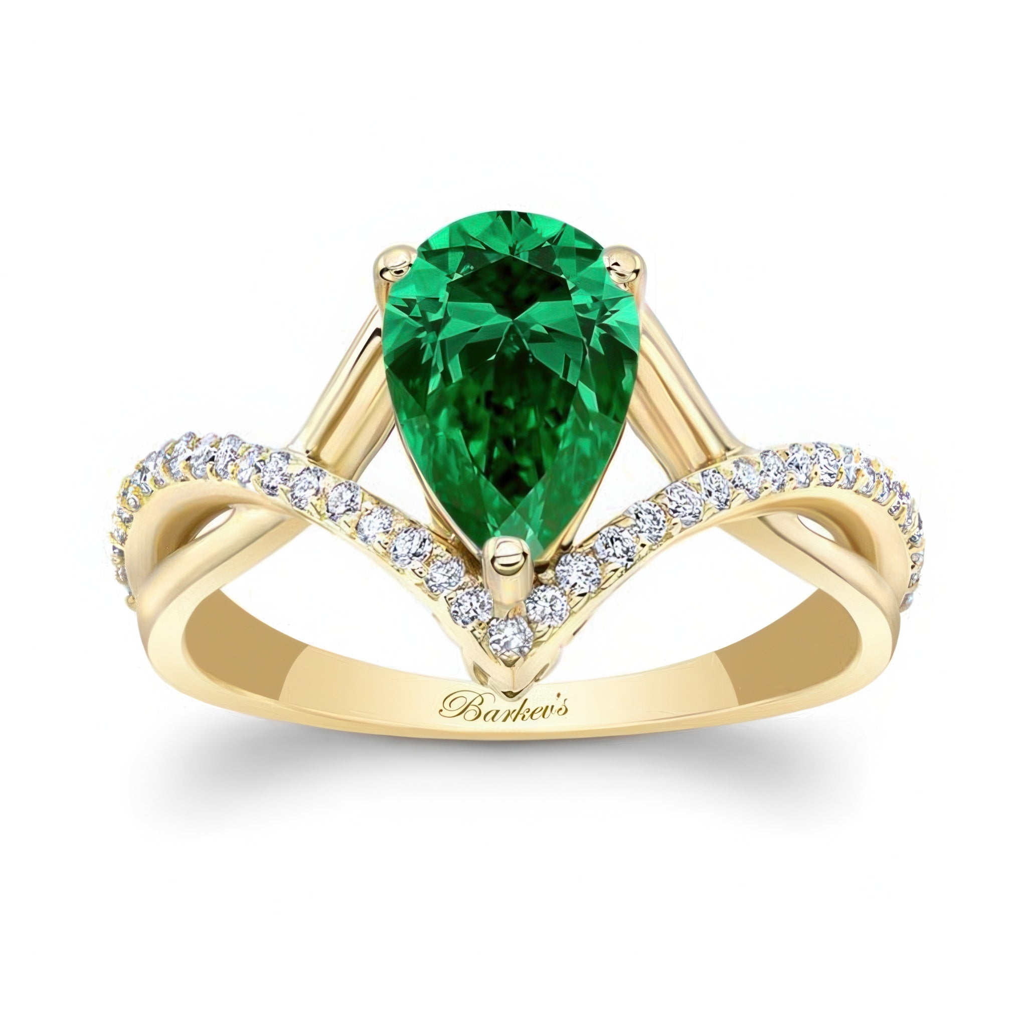 Unique Pear Shaped Emerald And Diamond Ring