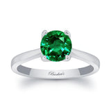 Delicate Curved Emerald Solitaire Ring