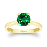 Delicate Curved Emerald Solitaire Ring