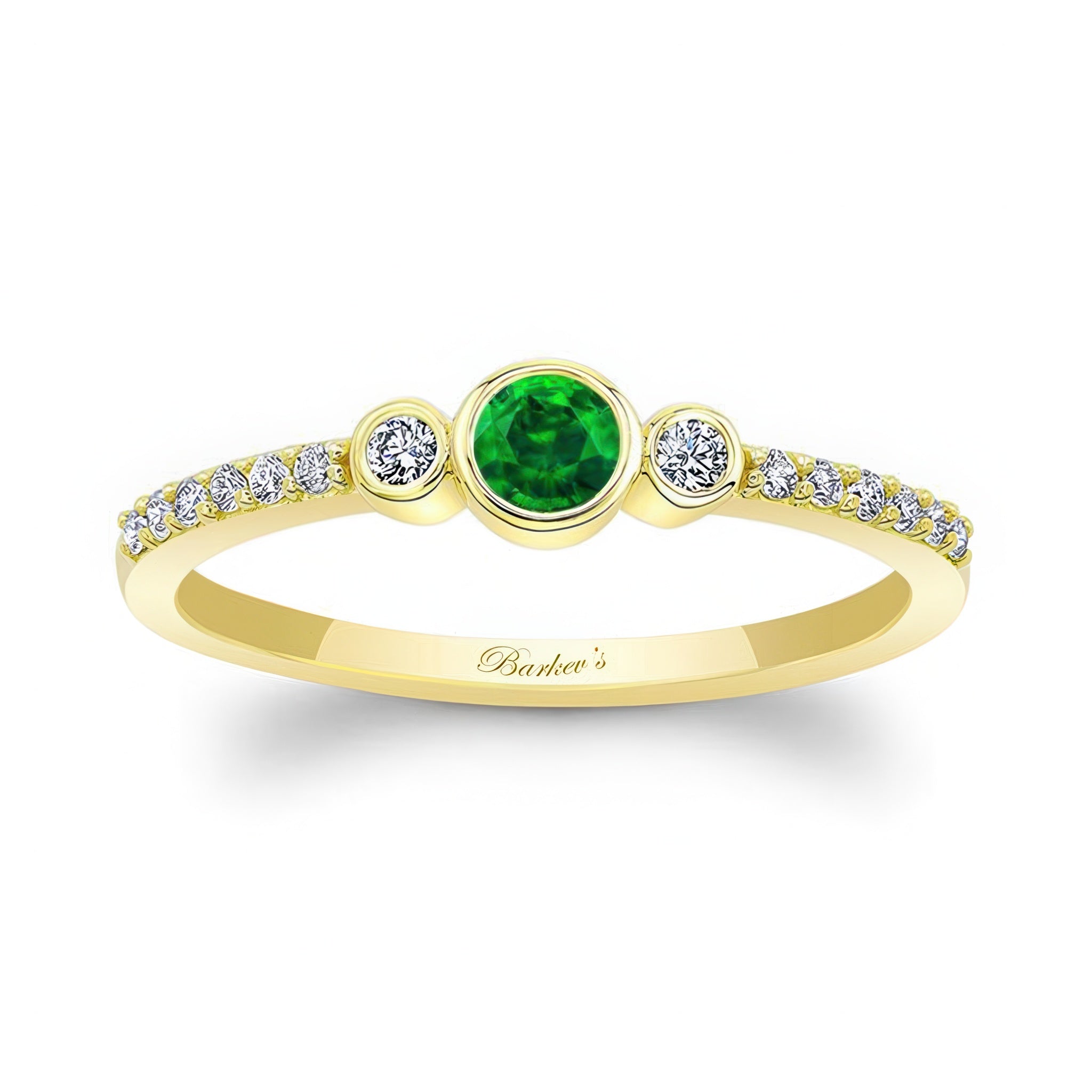 Mia Emerald three stone diamond promise ring featuring a vibrant emerald center and sparkling diamond accents.