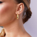 Hollow Tapered Gold Oval Hoop Earrings