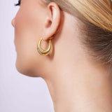 Hollow Tapered Gold Oval Hoop Earrings