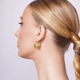 Hollow Tapered Gold Oval Hoop Earrings
