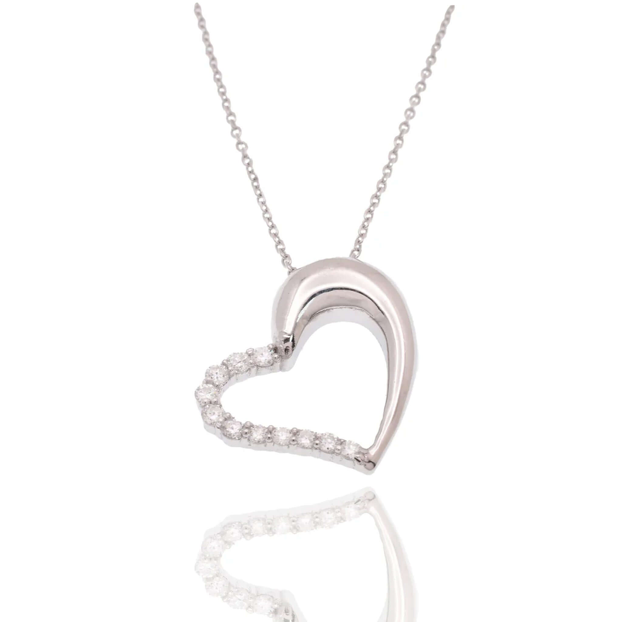Lab Diamond Half-Pave Heart Necklace in polished silver with round lab-grown diamonds, reflecting light beautifully.