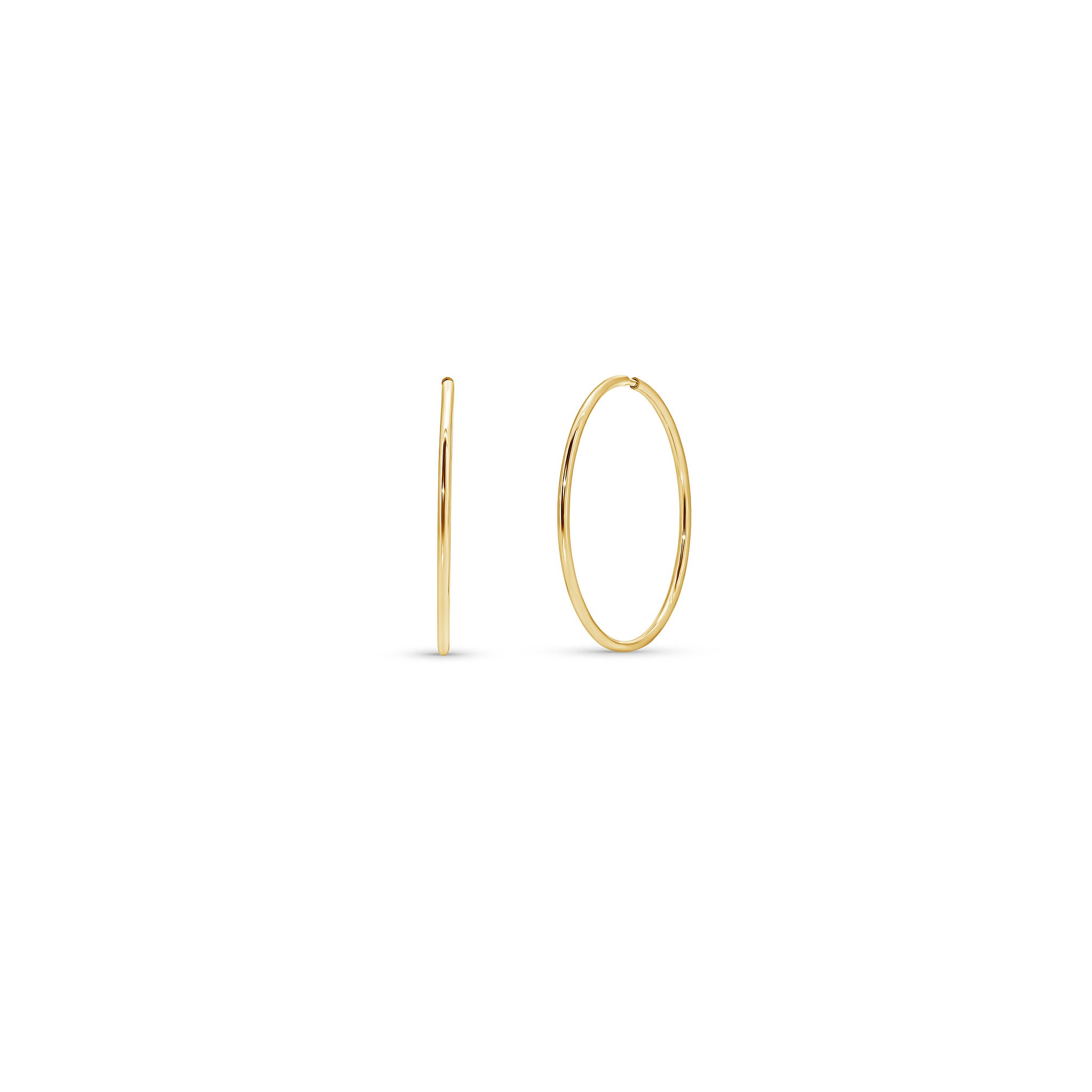 Gold Endless Hoop Earrings showcasing a timeless, seamless design perfect for any occasion.