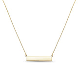 Gold bar engravable necklace on a white background
