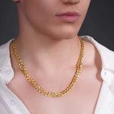 Men's solid gold curb chain necklace displayed on model, featuring interconnected flattened links.