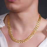 Men's solid gold curb chain necklace, showcasing its stylish interlocking links and bold design.