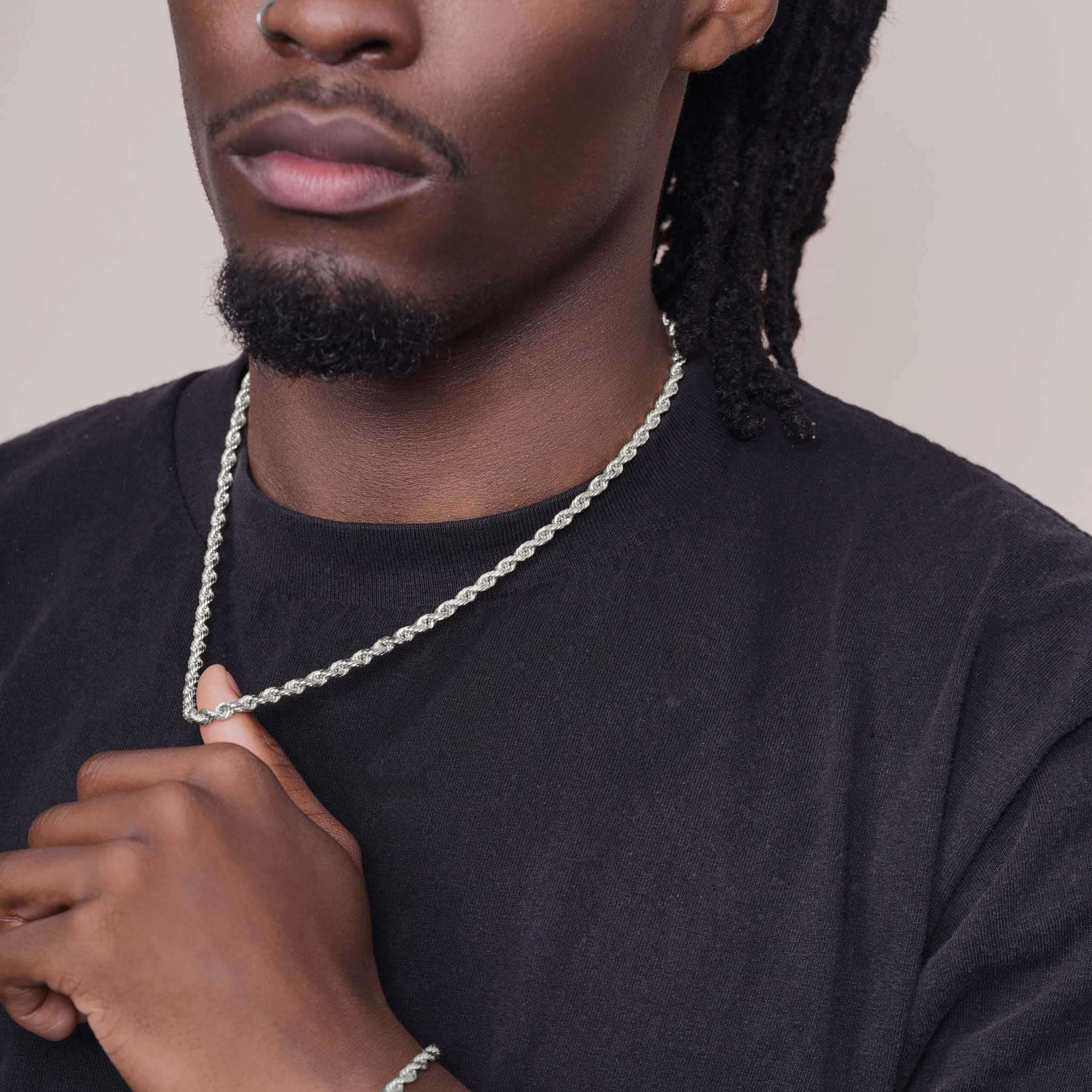 Solid 18K White Gold Rope Chain worn by a model, showcasing its intricate twisted links and luxurious finish.