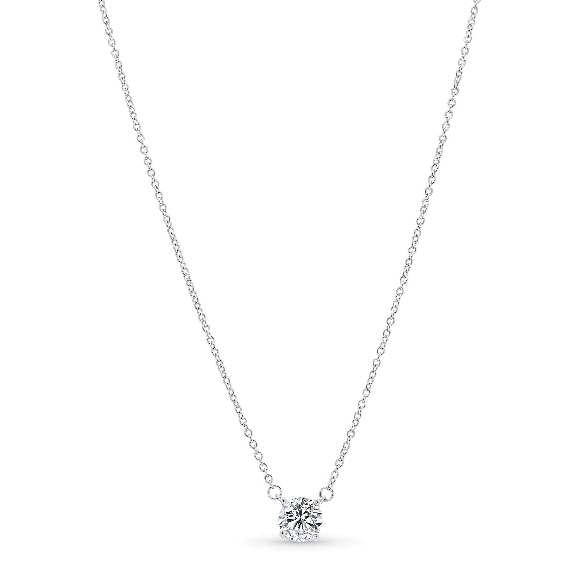 Round Moissanite Silver Pendant Necklace featuring a brilliant moissanite stone on a delicate silver chain.
