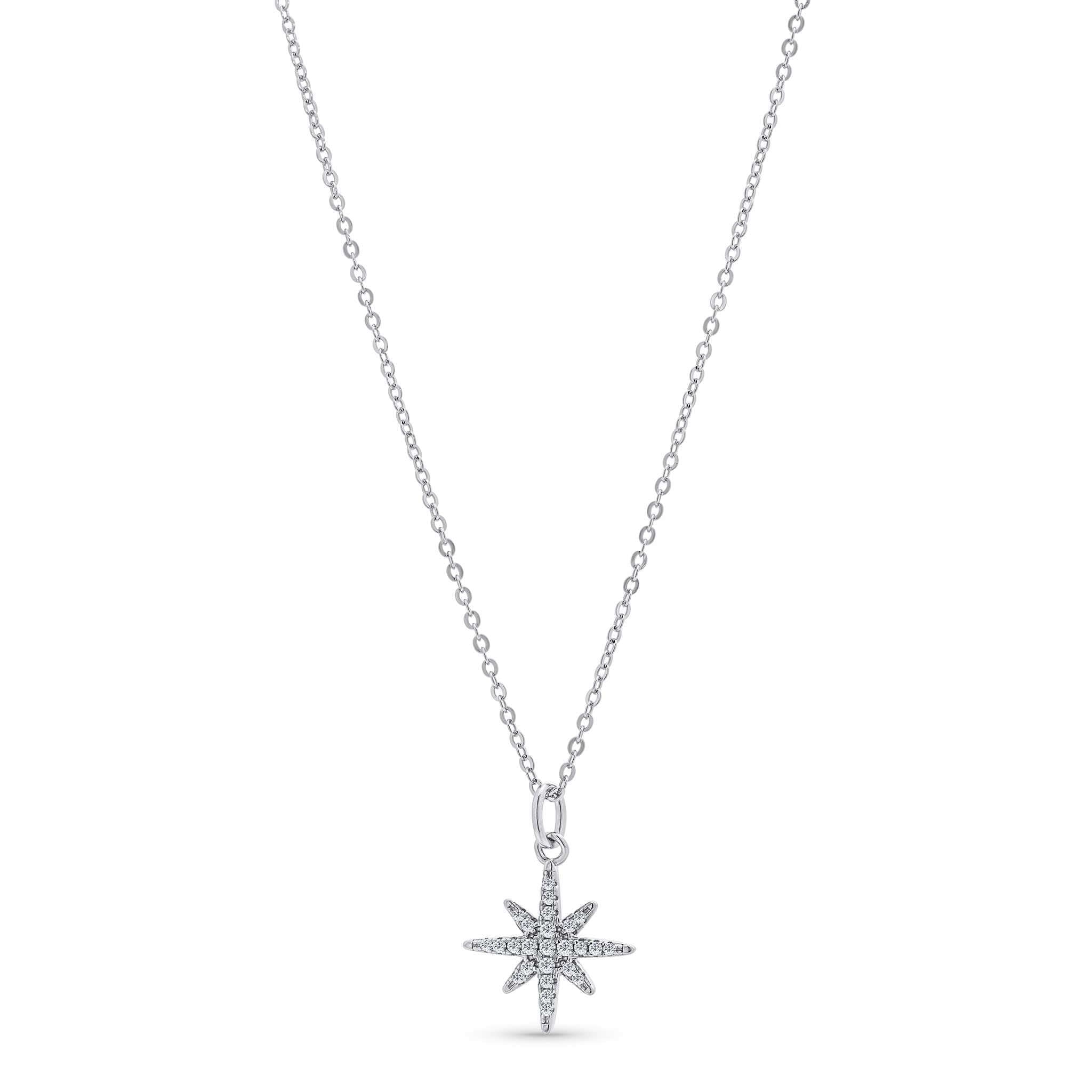 Star-shaped moissanite pendant on a chain against a white background