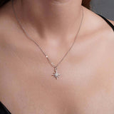 Star Shaped Moissanite Silver Pendant Necklace worn on a woman's neck, showcasing its dazzling star design.
