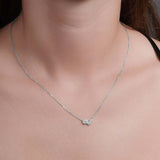 Graduating Bezel Trio Moissanite Silver Pendant Necklace showcased on a model, highlighting its elegant design and sparkle.