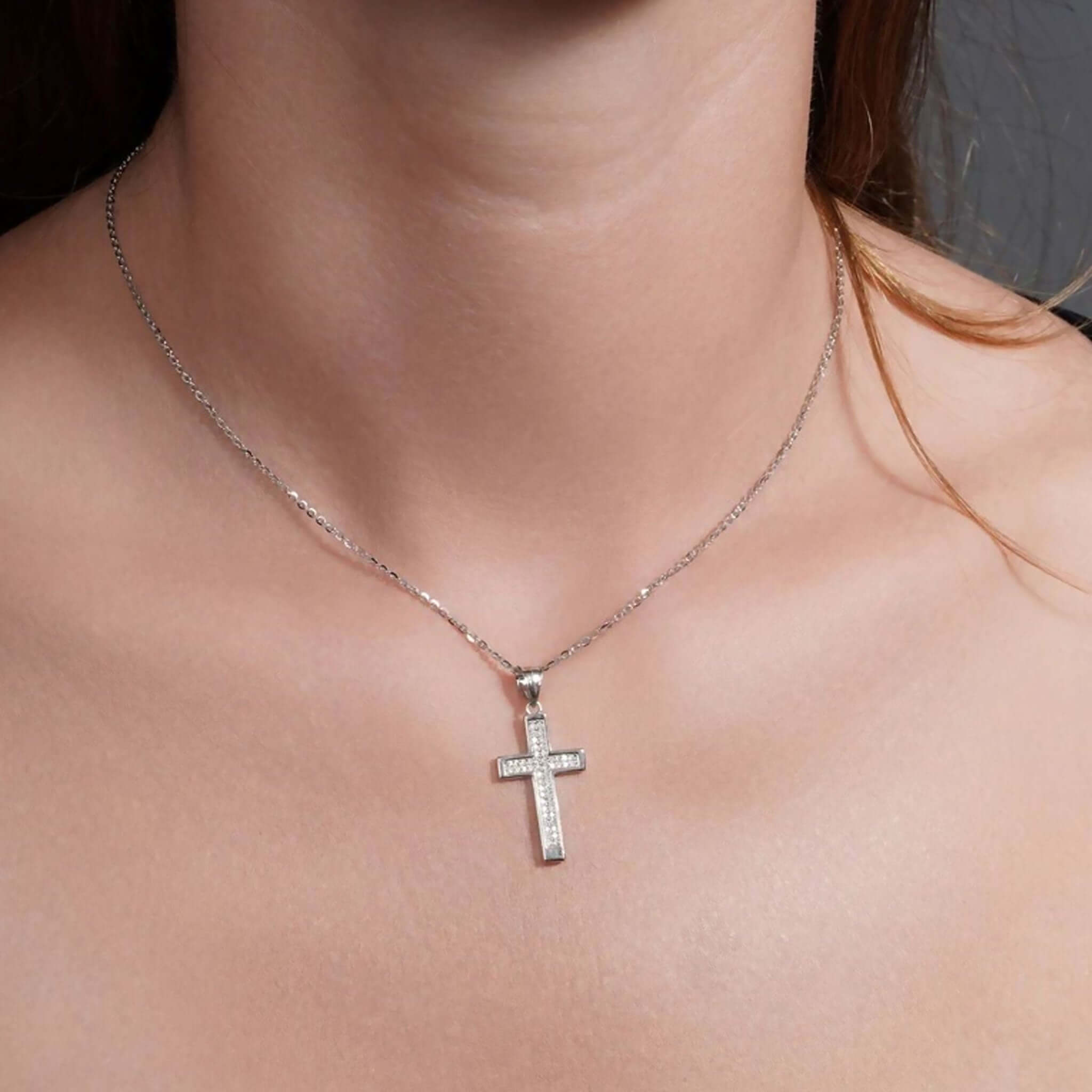 Double Row Cross Moissanite Silver Pendant Necklace worn on a model's neck showcasing its elegant design and sparkling stones.