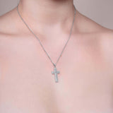 Framed Moissanite Cross Silver Pendant Necklace worn on a model, showcasing its exquisite design and brilliant sparkle.