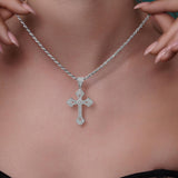 Silver Moissanite Flared Cross Pendant Necklace worn on a model, showcasing its shimmering design and silver rope chain.