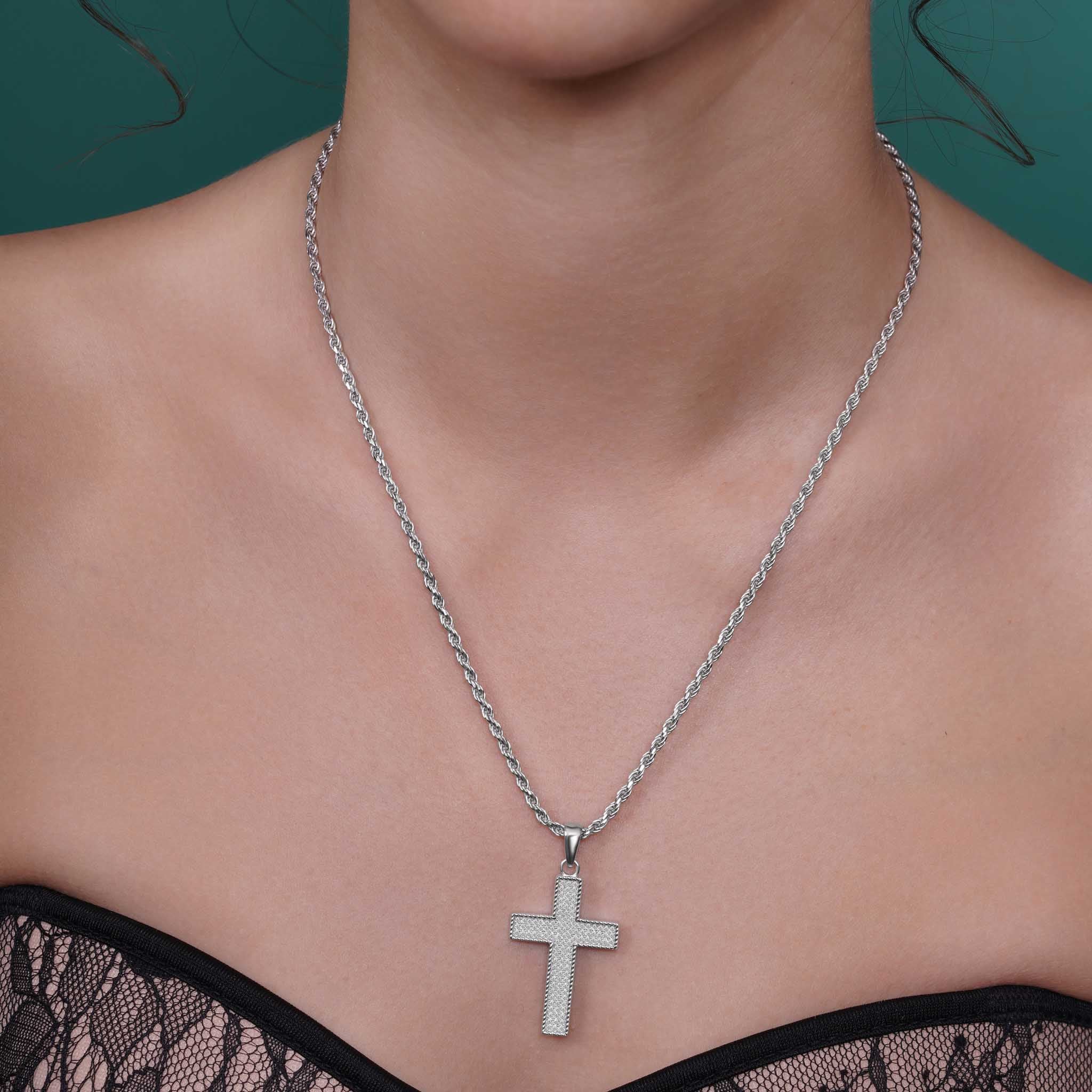 Silver Moissanite Pavé Milgrain Cross Pendant Necklace worn on a model, highlighting its elegant design and sparkle.