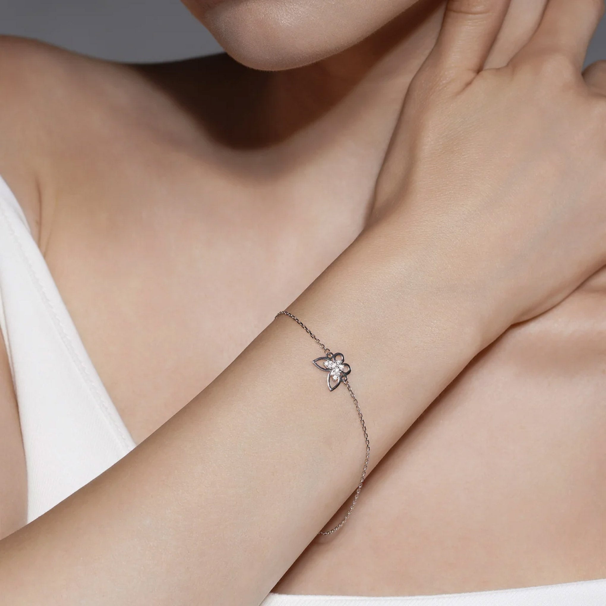 Moissanite Butterfly Charm Bracelet in Sterling Silver