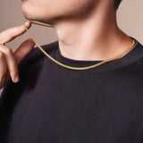 Men's Vermeil Miami Cuban Chain worn casually, showcasing its elegance and durability on a black T-shirt.