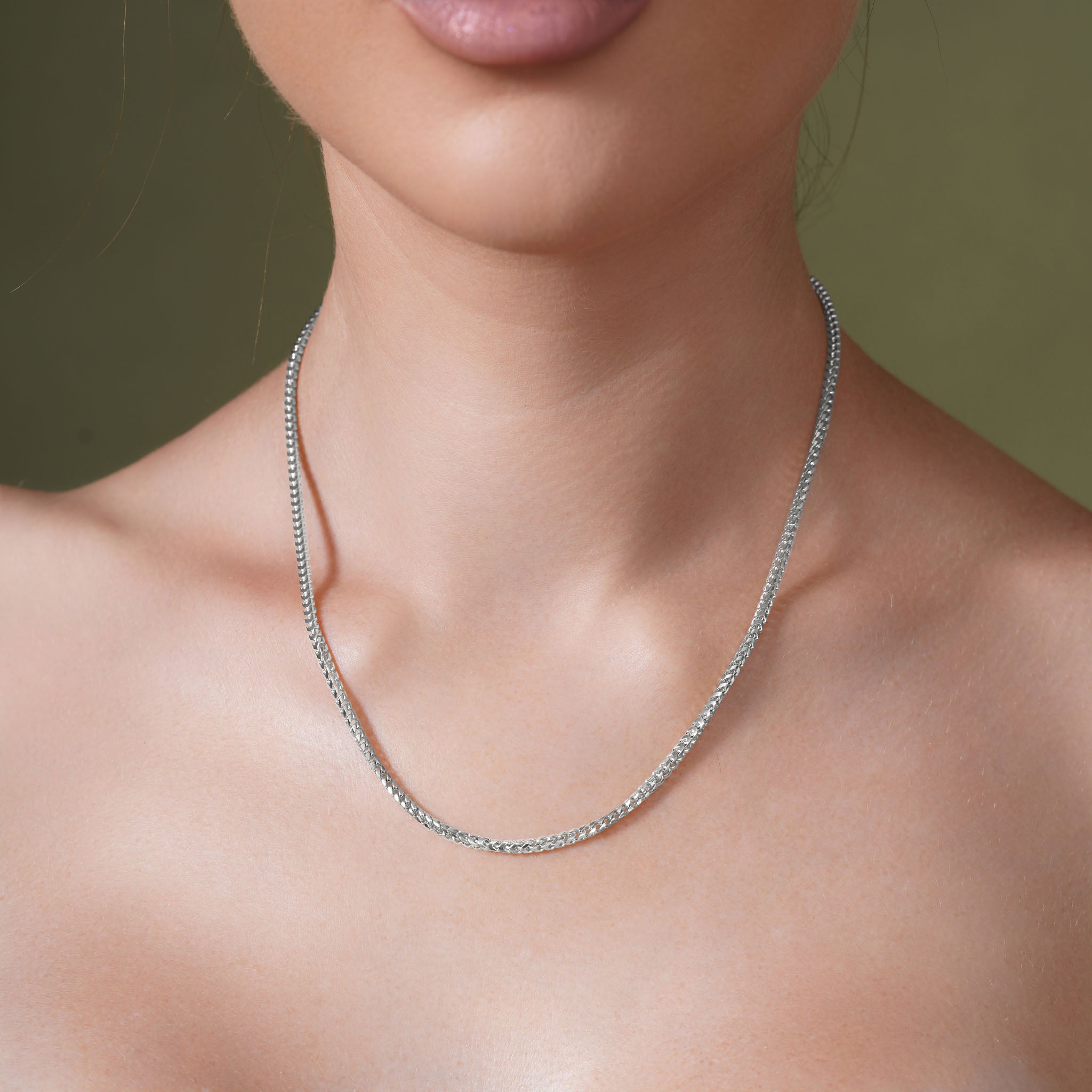Franco Silver Chain worn by a model, showcasing its polished finish and elegant design.