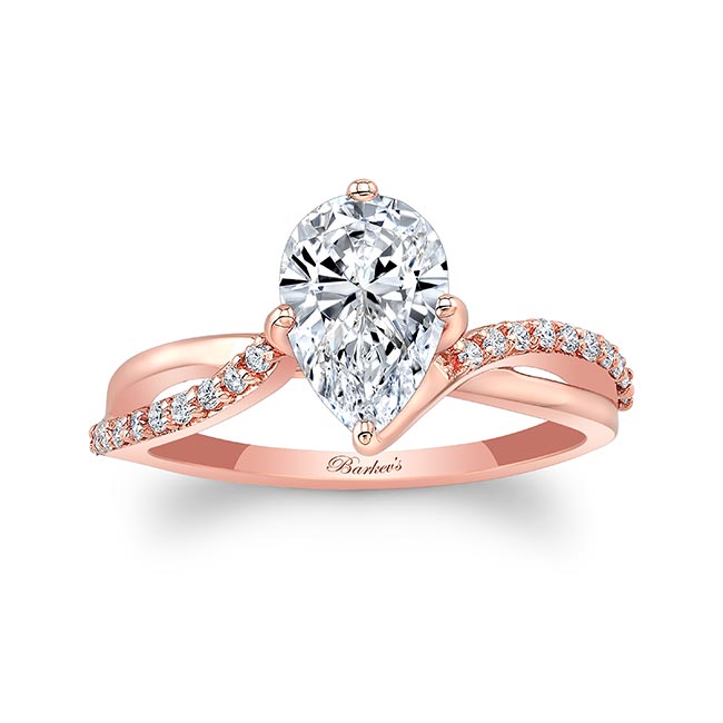 Pear Shaped Moissanite Engagement Ring With Twisted Band